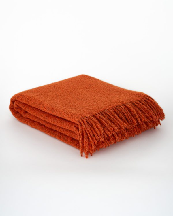 Luxe bouclé plaid Paris in oranje kleur, gemaakt van 80% wol en 20% polyester